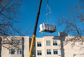 Crane rental for HVAC installation